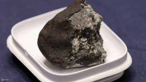 WASHINGTON, DC - JUNE 17:  A piece of the Chelyabinsk meteorite is displayed before a hearing of the House Administration Committee in the Longworth House Office Building on Capitol Hill June 17, 2015 in Washington, DC. Famously caught by a number of video cameras, the meteorite fell to earth February 15, 2013 and caused a large amount of damage in the city of Chelyabinsk, Russia.  (Photo by Chip Somodevilla/Getty Images)