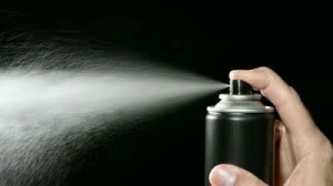 stock-footage-a-man-depresses-the-trigger-on-an-aerosol-spray-can